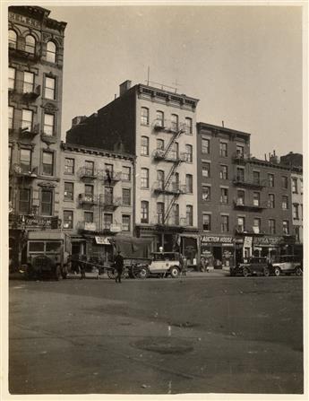 (LOWER EAST SIDE--NEW YORK CITY) Album containing 62 photographs of the Lower East Side by an unidentified photographer who has a keen